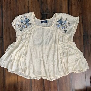 Cream flowy top with blue floral embroidery size L